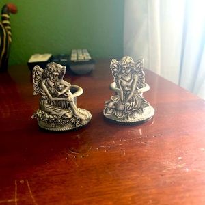 Pair of Fairy candlestick holders.